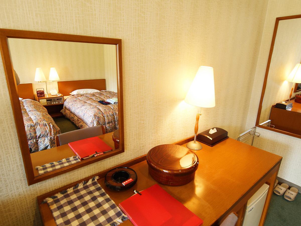 טוקושימה Kamiyama Onsen Hotel Shikinosato & Iyashinoyu מראה חיצוני תמונה
