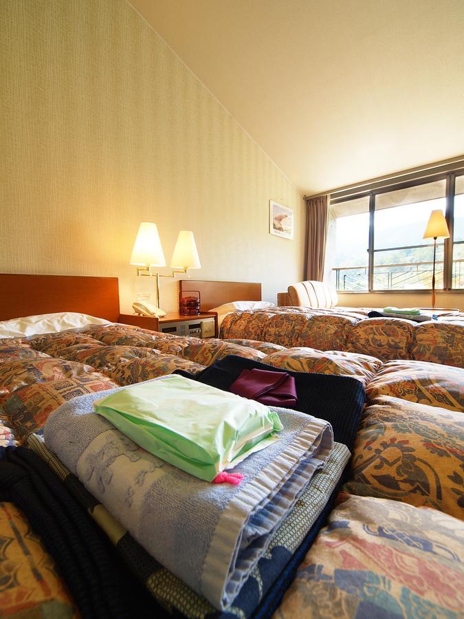טוקושימה Kamiyama Onsen Hotel Shikinosato & Iyashinoyu מראה חיצוני תמונה